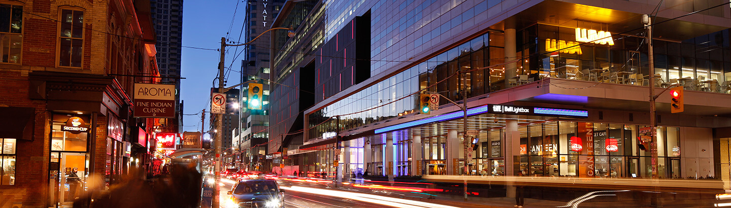 Night shot of King Street West in Toronto. 