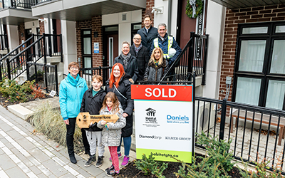 Three Habitat for Humanity families in the GTA welcomed home at Daniels FirstHome™ Keelesdale just in time for the holidays